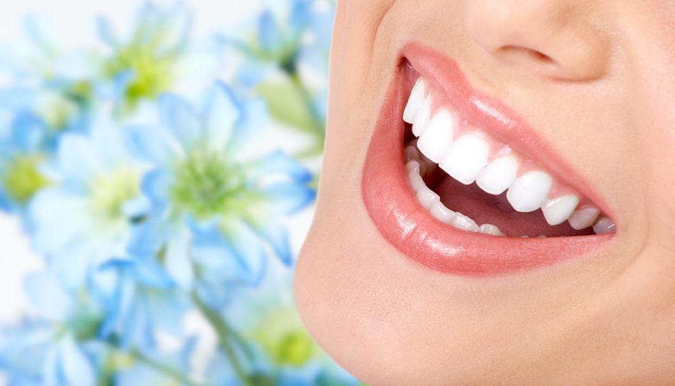 bigstock-Woman-smile-and-teeth-Dental-25845860.jpg