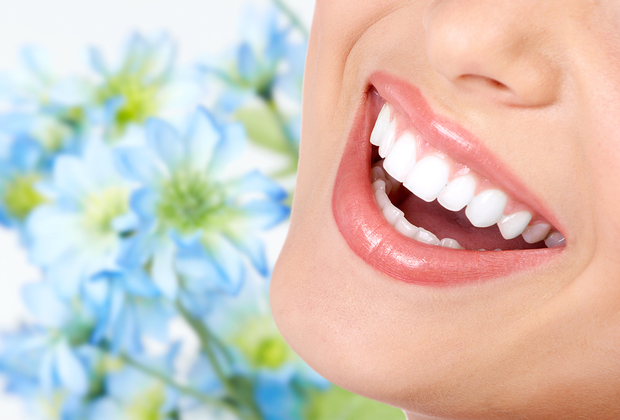 bigstock-Woman-smile-and-teeth-Dental-25845860.jpg