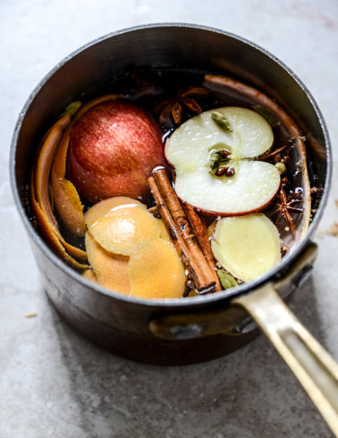 A bounty of aromatics (like apple slices, cinnamon sticks, and cloves) waft through your home entire home when you warm them in water on the stove. Get the tutorial at How Sweet It Is » 