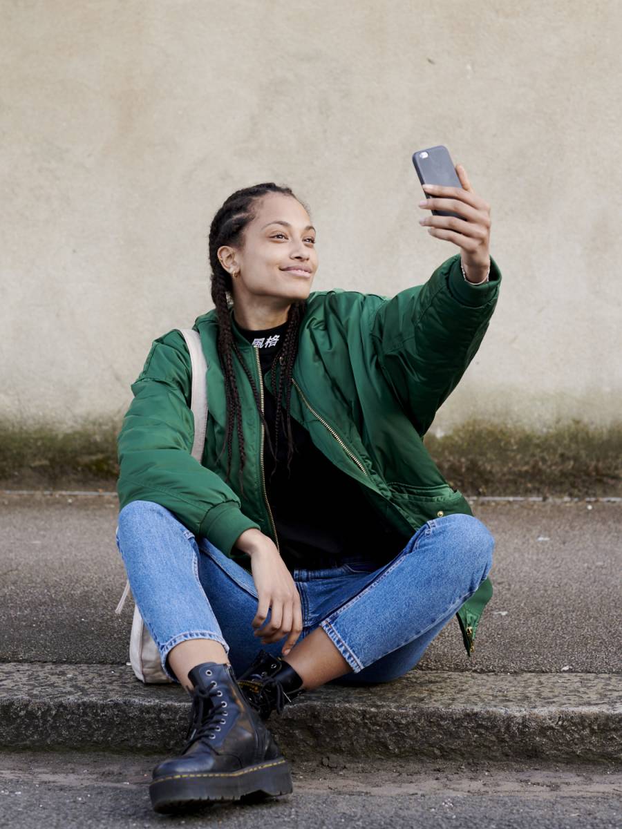 how to take a good selfie women in jacket taking selfiejpg